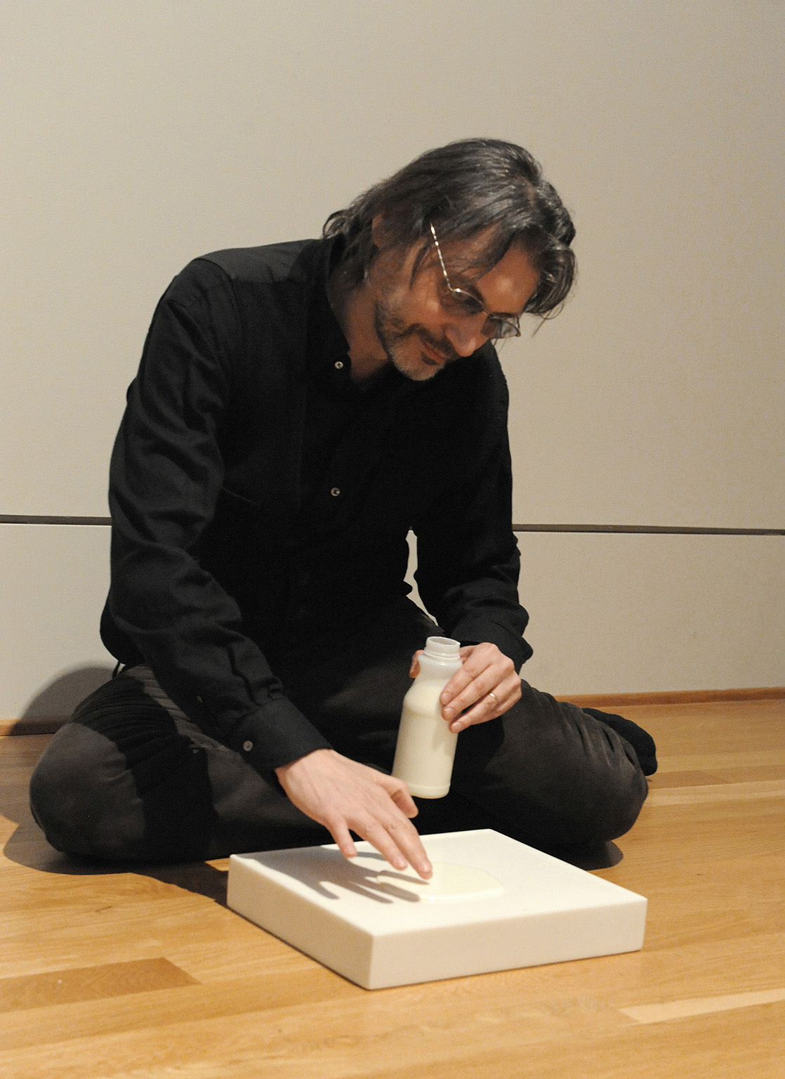 Pouring a milkstone by Wolfgang Laib