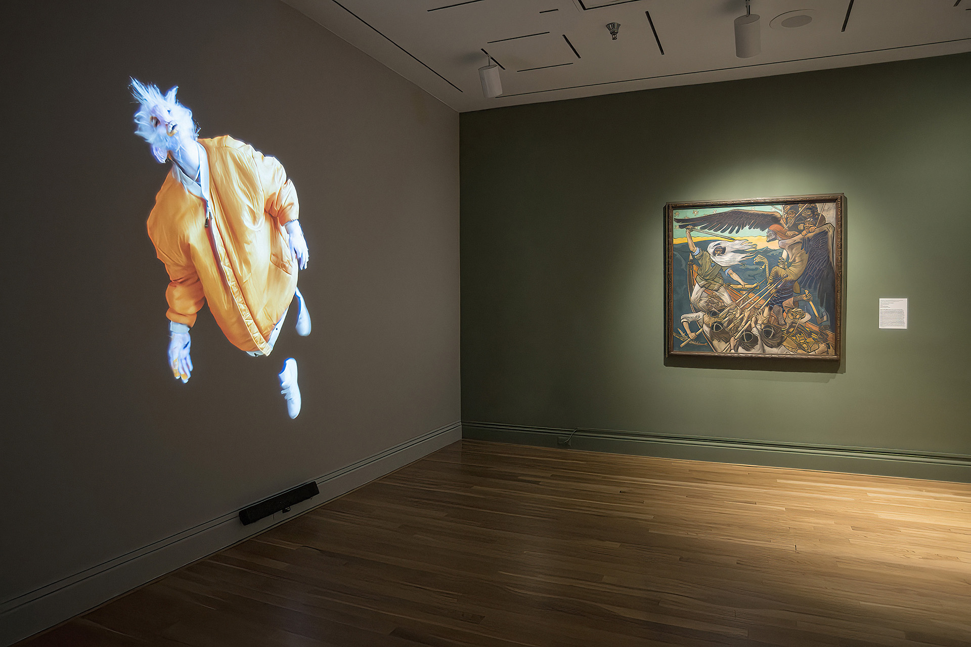 installation view with video projection and painting